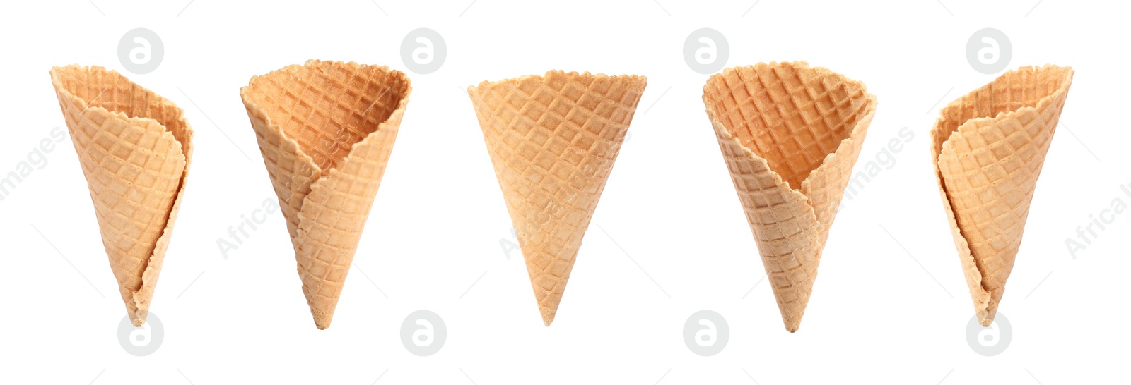 Image of Set of empty wafer ice cream cones on white background. Banner design