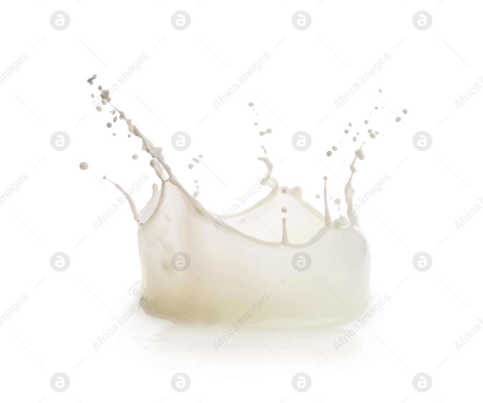 Photo of Splash of fresh milk isolated on white