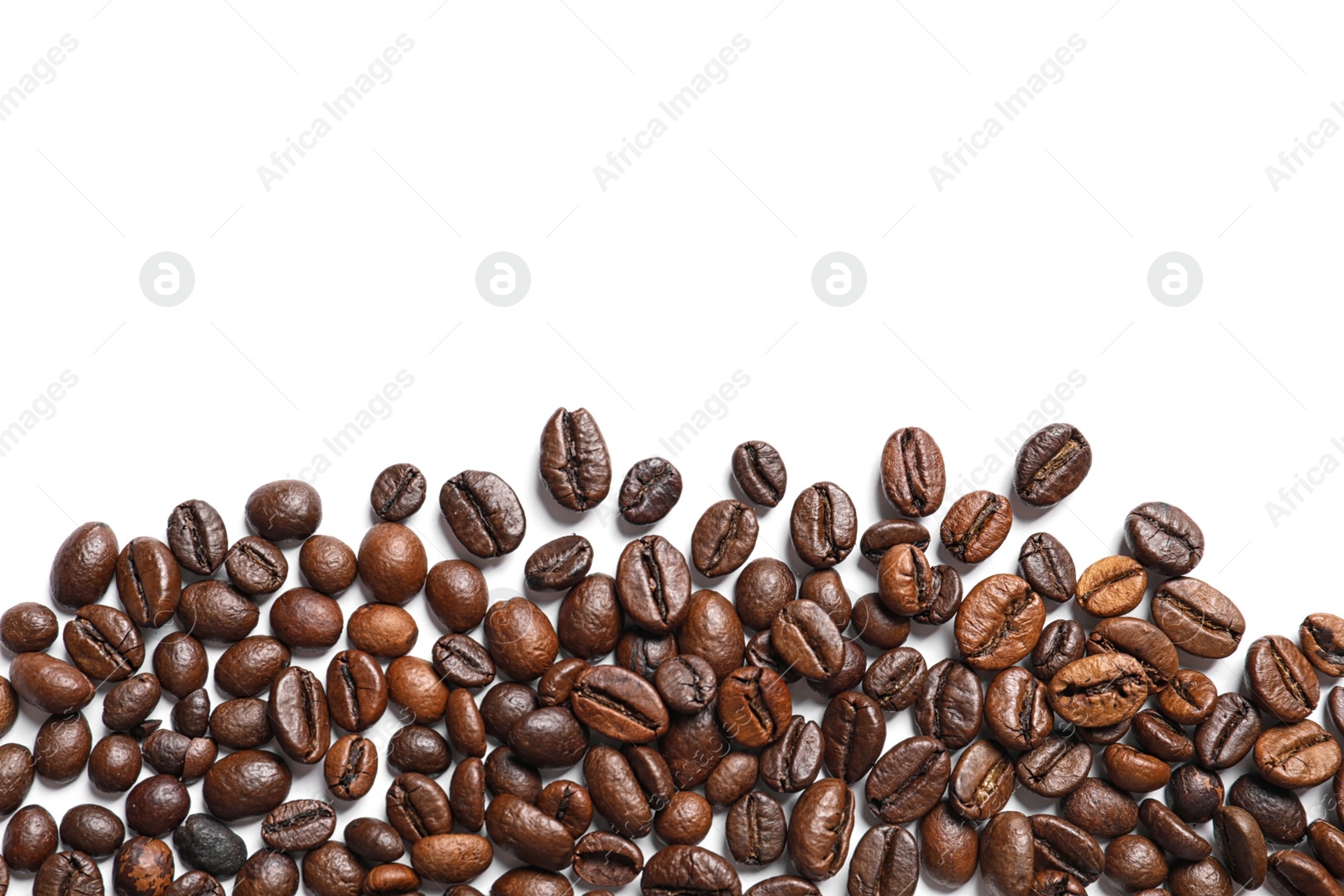 Photo of Roasted coffee beans on white background, top view