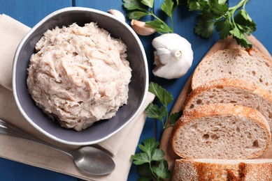 Delicious lard spread on blue wooden table, flat lay