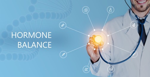 Image of Doctor holding stethoscope and virtual screen with inscription Hormone Balance and digital icons on light blue background, closeup