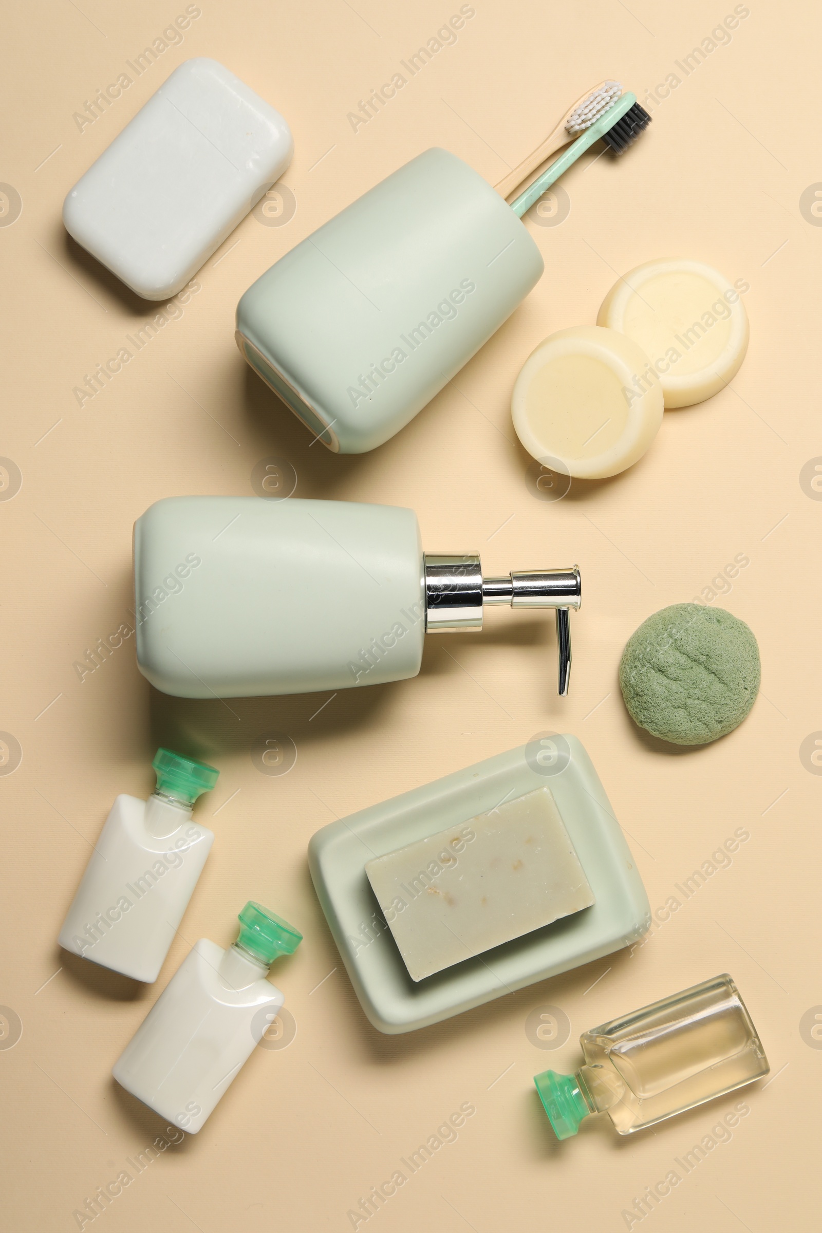 Photo of Bath accessories. Flat lay composition with personal care products on beige background