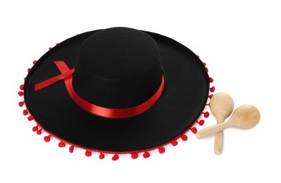 Mexican sombrero hat and maracas isolated on white