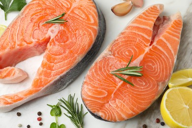 Fresh salmon and ingredients for marinade on table, flat lay