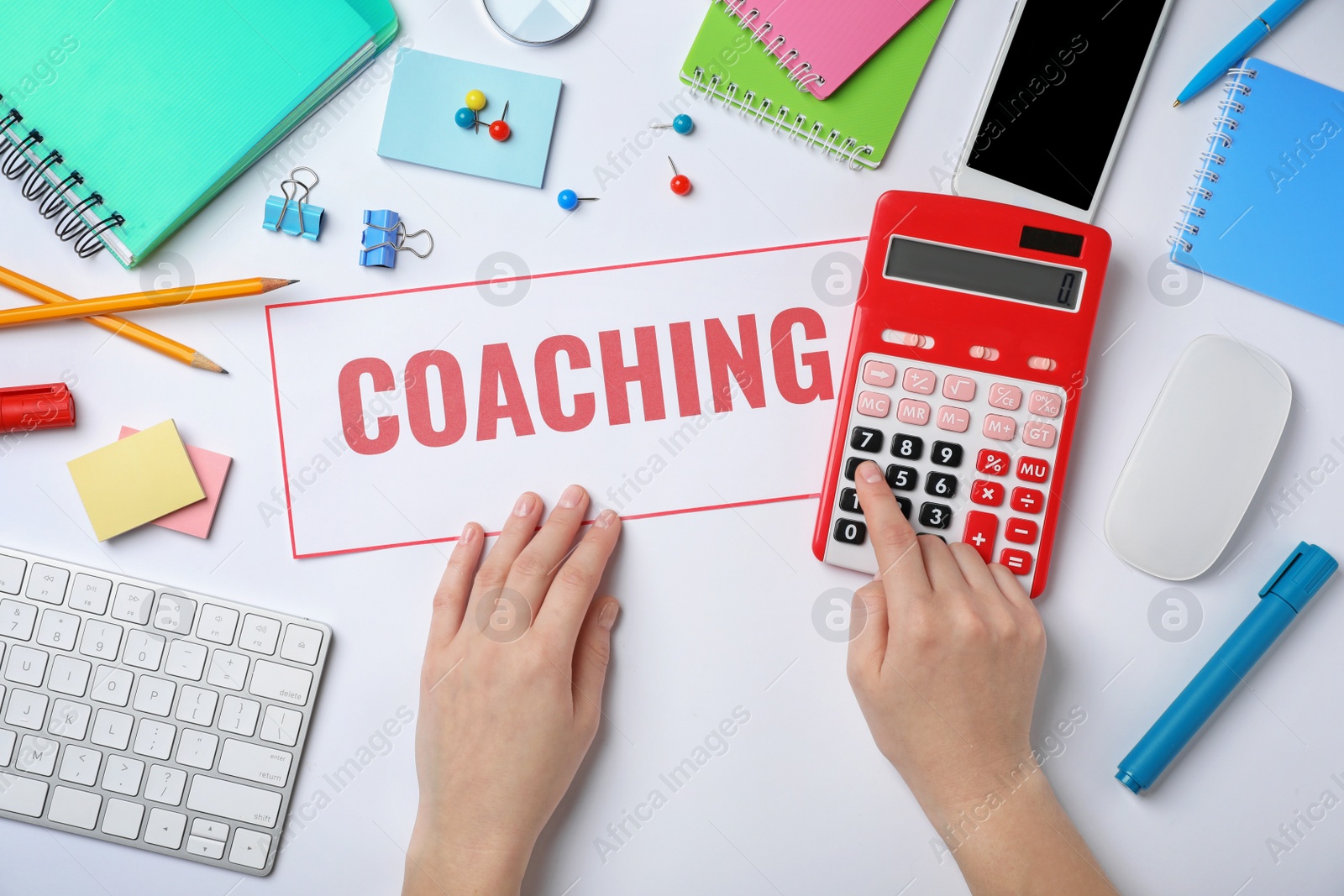 Photo of Word COACHING and woman with calculator on white background. Business trainer concept