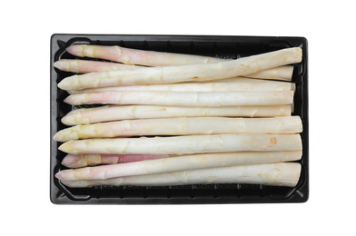 Photo of Fresh ripe asparagus in plastic pack isolated on white, top view
