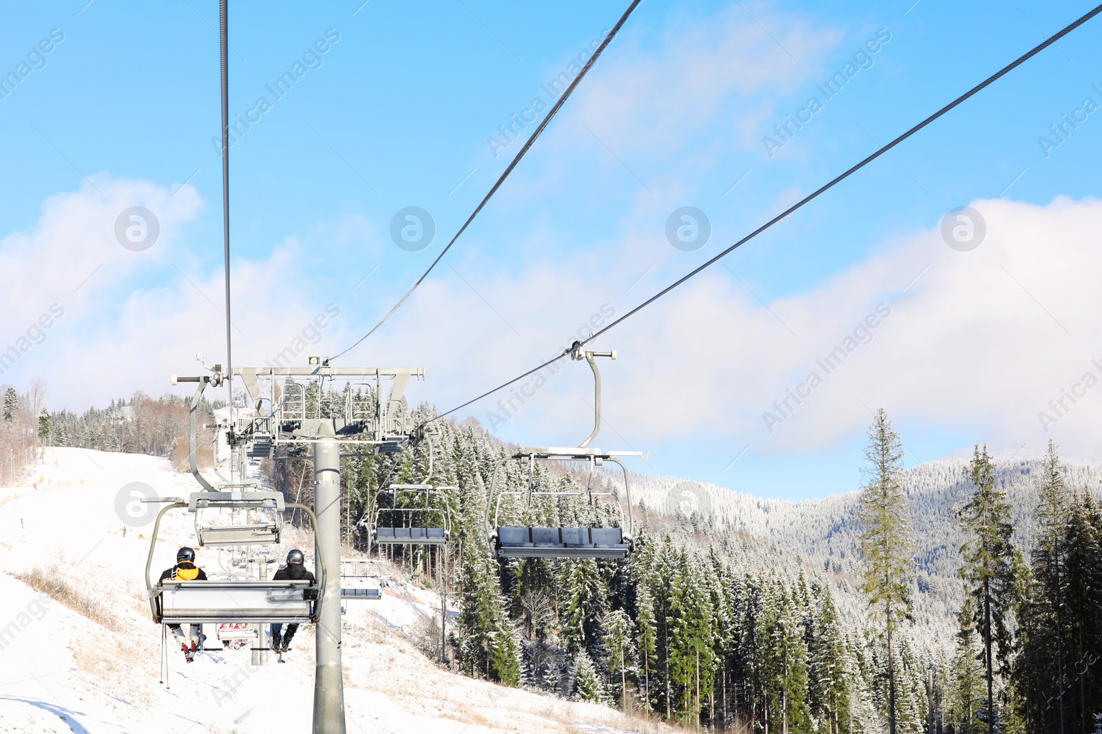 Photo of Beautiful mountain landscape with chairlift. Winter vacation