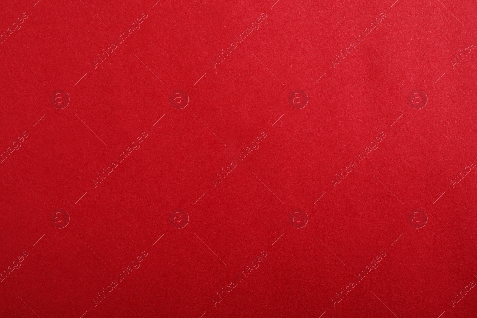 Photo of Abstract red background, top view. Colorful paper