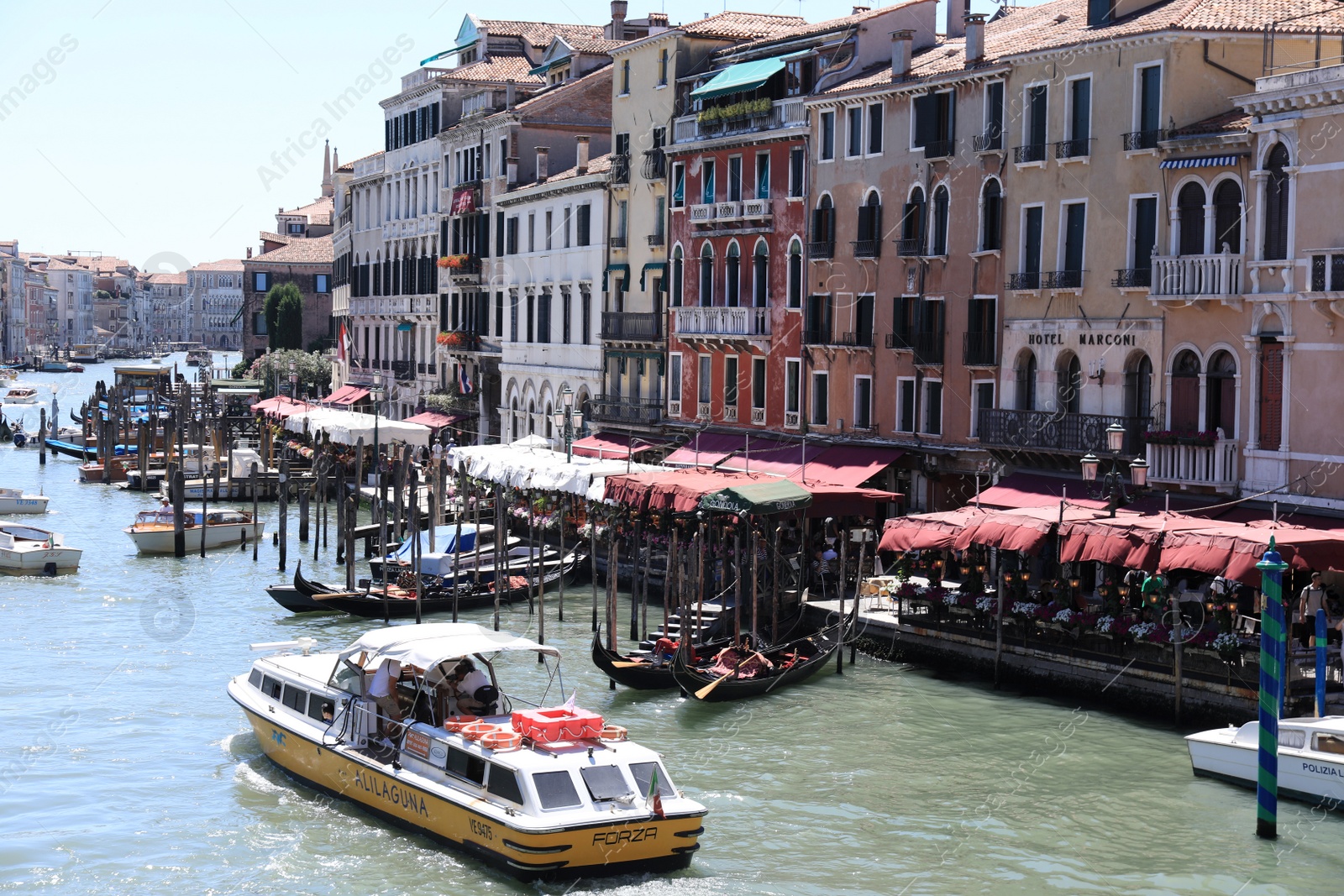 Photo of VENICE, ITALY - JUNE 13, 2019: Picturesque view of Grand Canal. Grand Canal is most famous channel in city