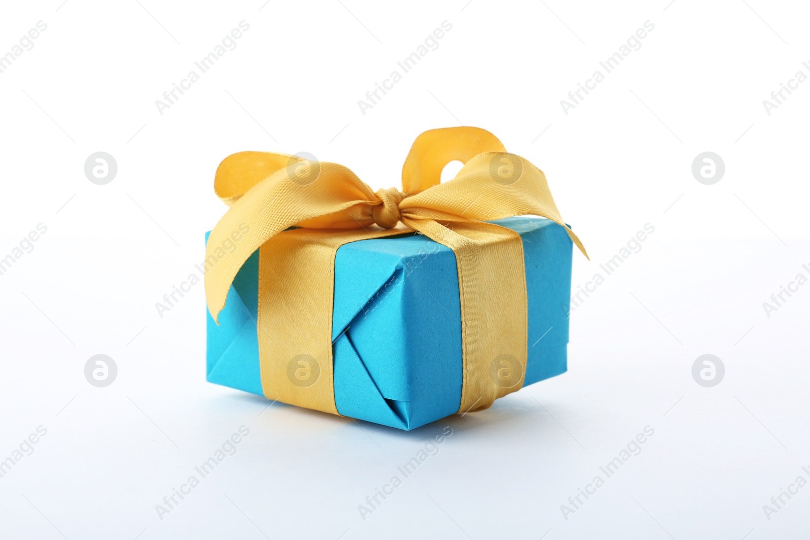 Photo of Beautiful gift box with ribbon on white background