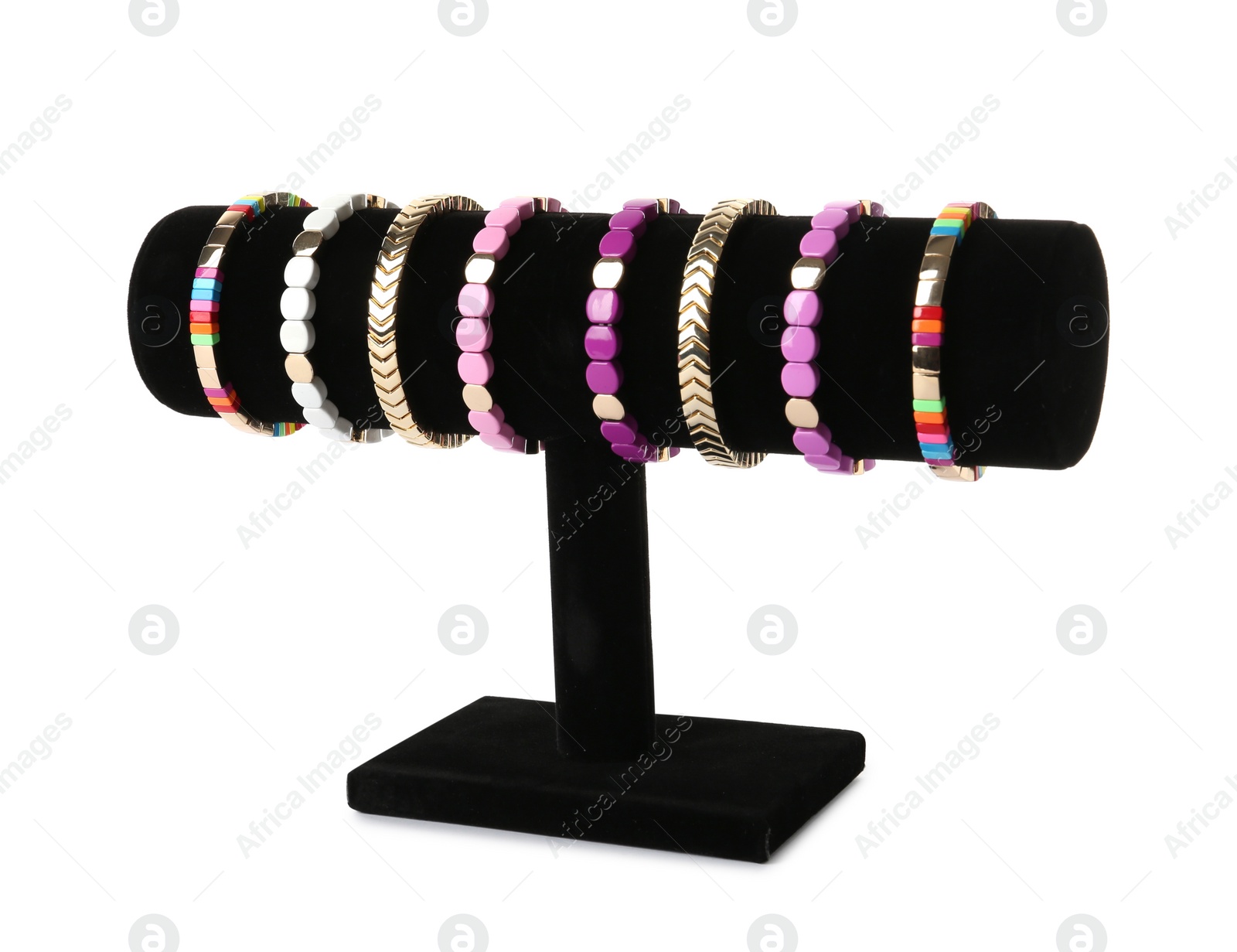 Photo of T-bar jewelry stand with stylish bracelets on white background