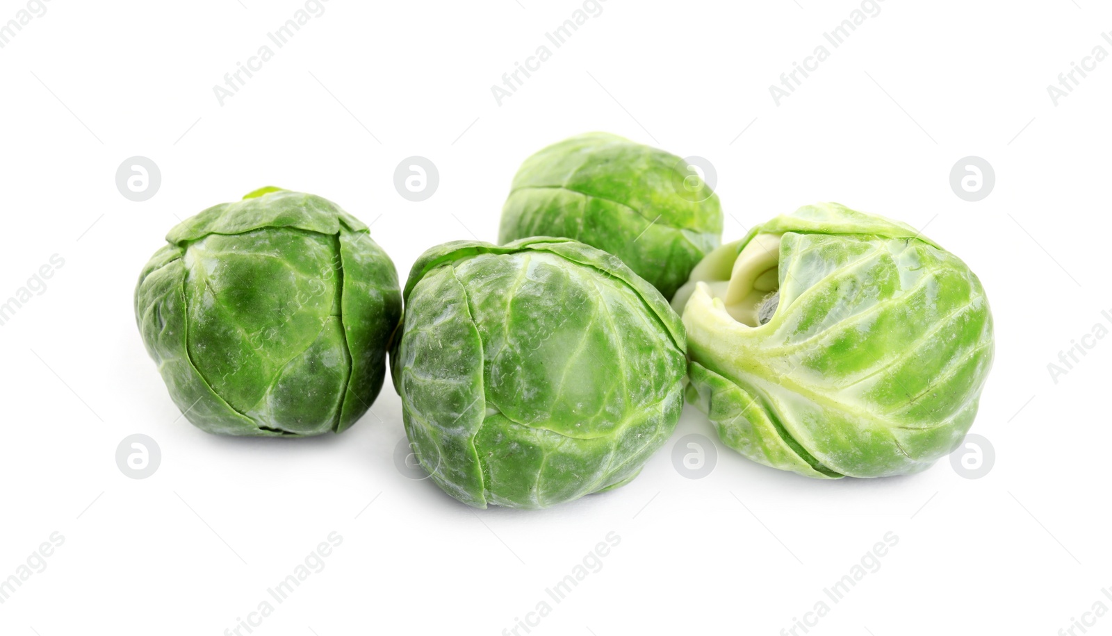 Photo of Fresh tasty Brussels sprouts isolated on white