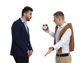 Businessman screaming at employee for being late on white background