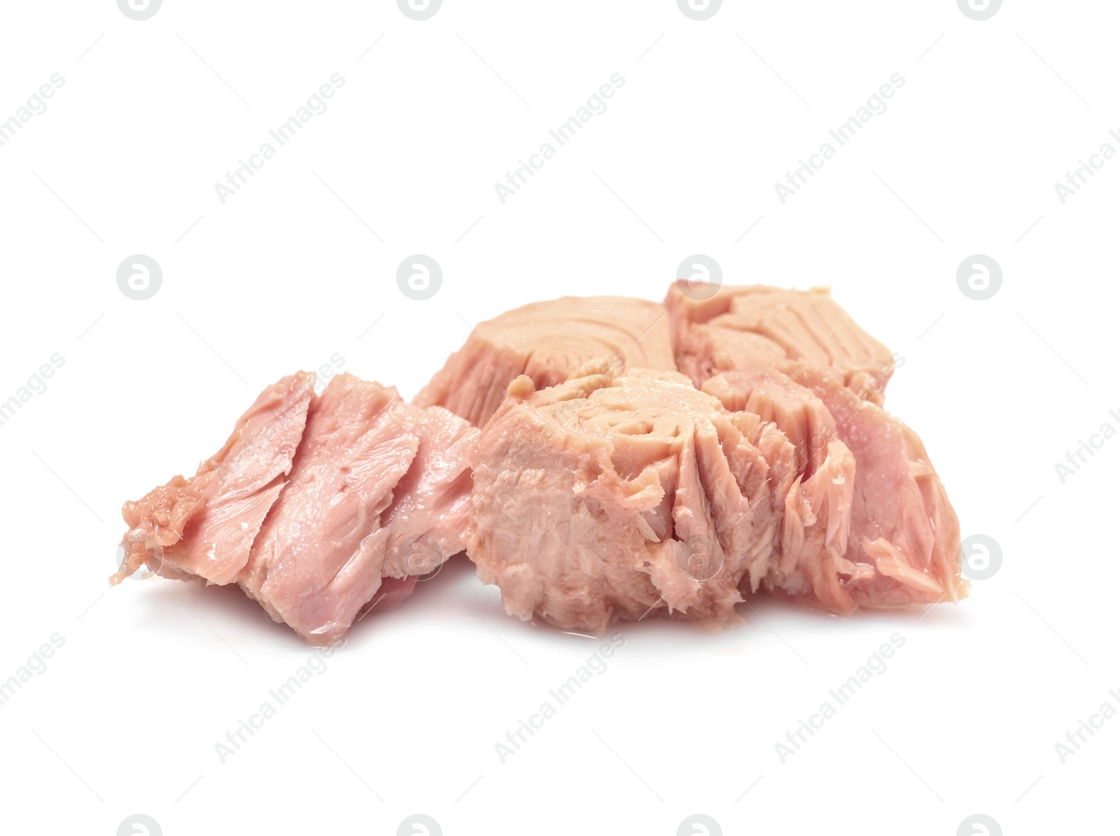 Photo of Pieces of canned tuna on white background