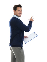 Young male teacher with clipboard on white background