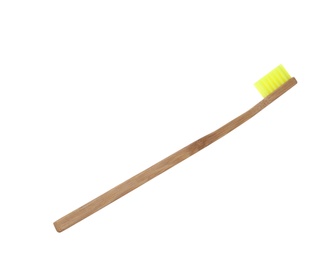 Photo of Bamboo toothbrush on white background. Dental care