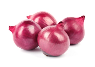 Photo of Fresh whole red onions on white background