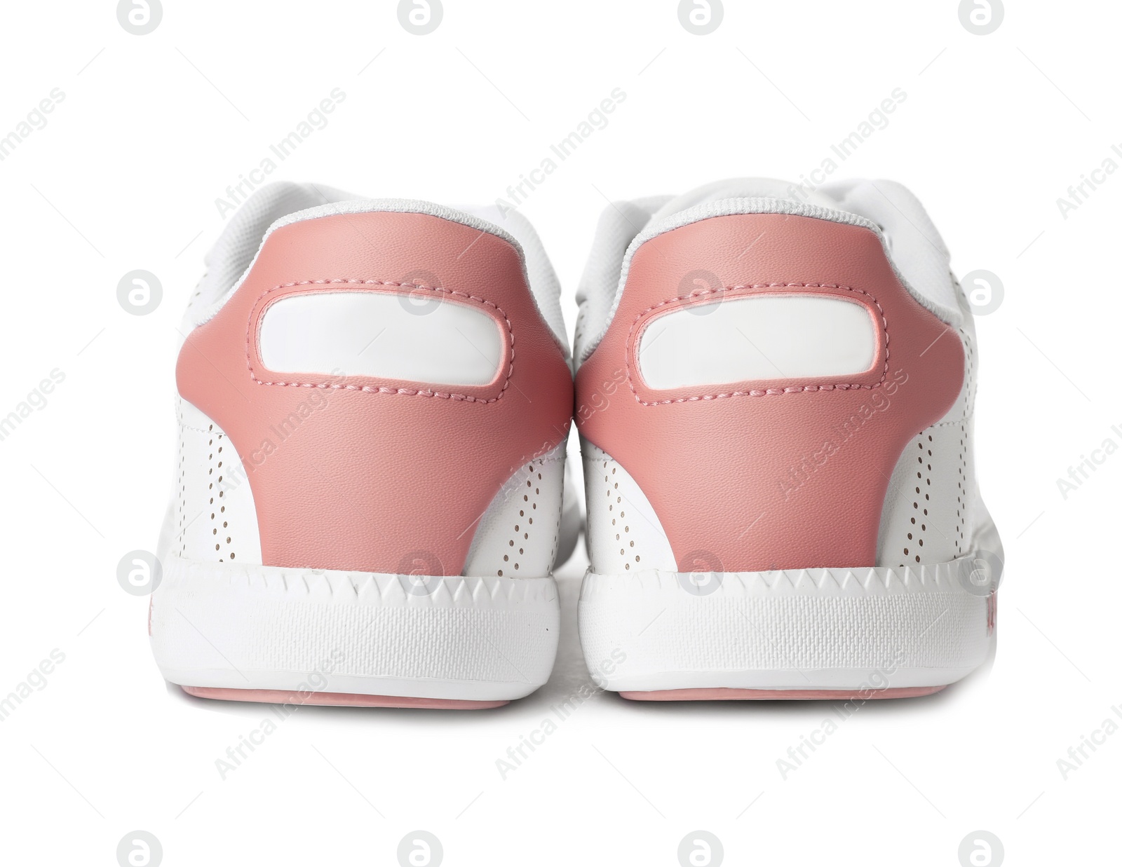 Photo of Pair of trendy sneakers on white background