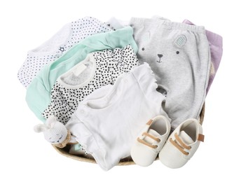 Photo of Laundry basket with baby clothes, shoes and toy isolated on white, top view