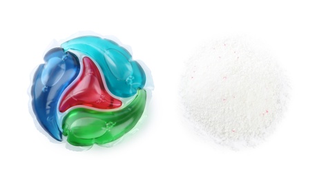 Photo of Laundry capsule and washing powder on white background, top view