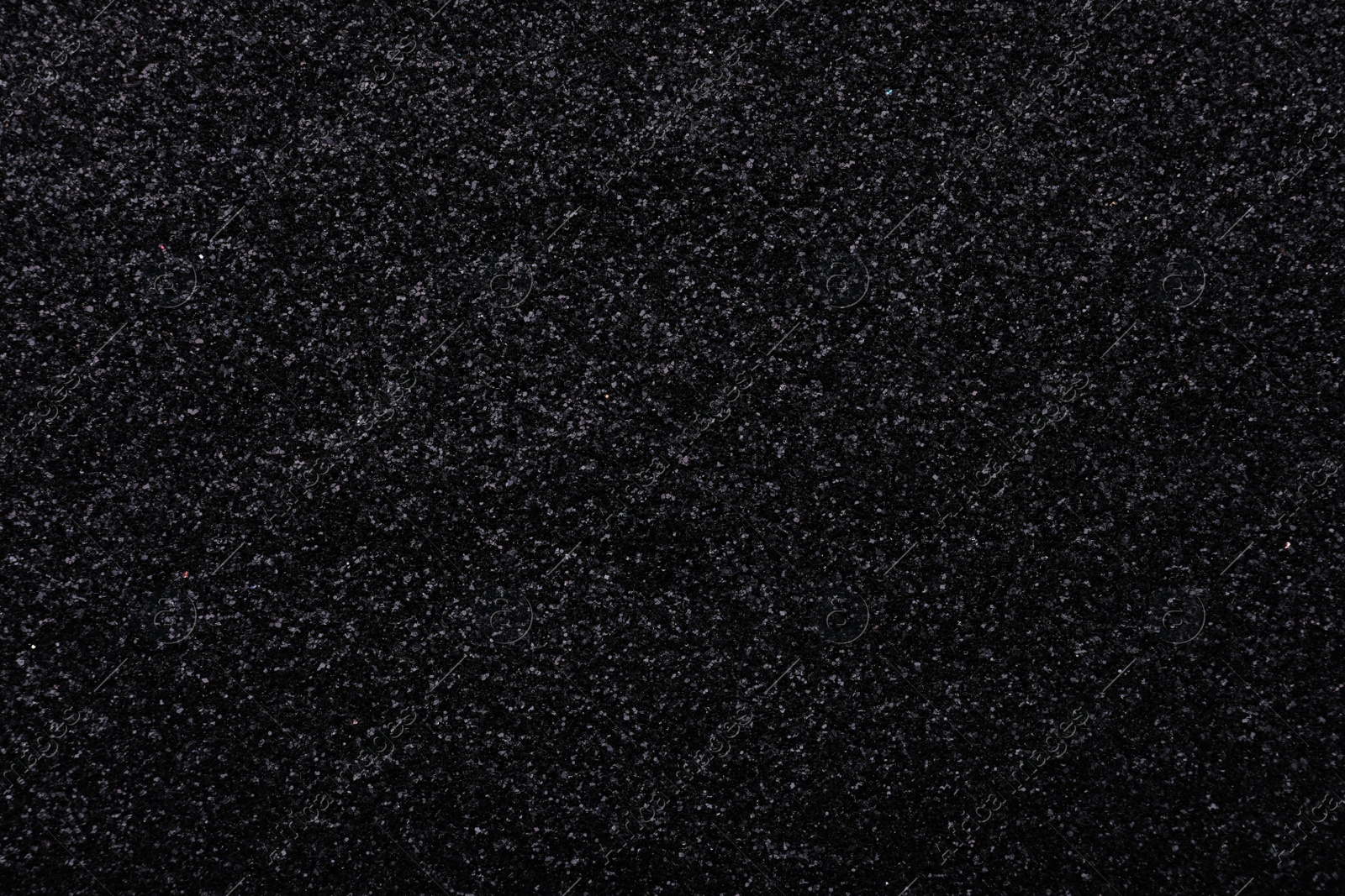 Photo of Beautiful shiny black glitter as background, closeup