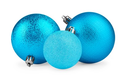 Beautiful light blue Christmas balls isolated on white