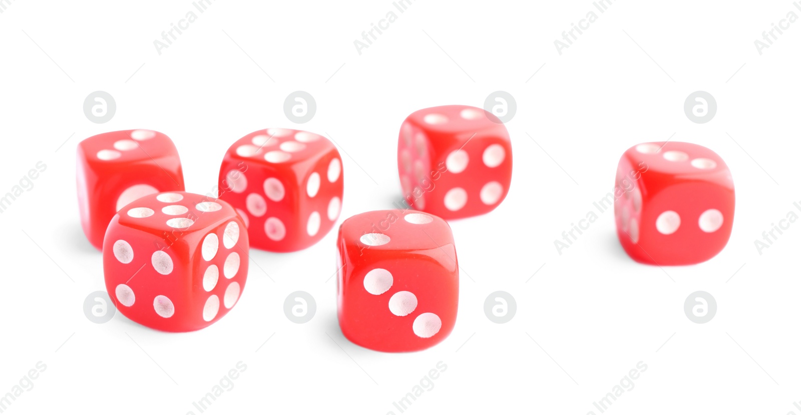 Photo of Many red game dices isolated on white