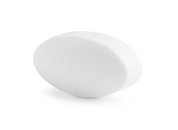 Photo of One pill on white background. Medicinal treatment