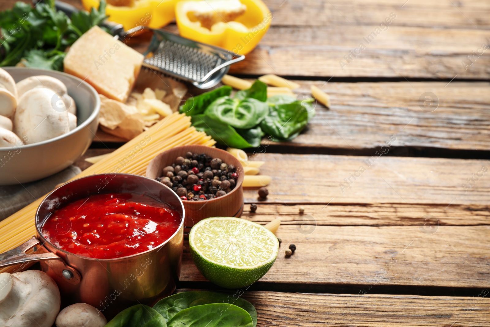 Photo of Fresh products on wooden table, space for text. Healthy cooking