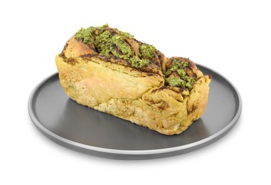 Plate with freshly baked pesto bread isolated on white