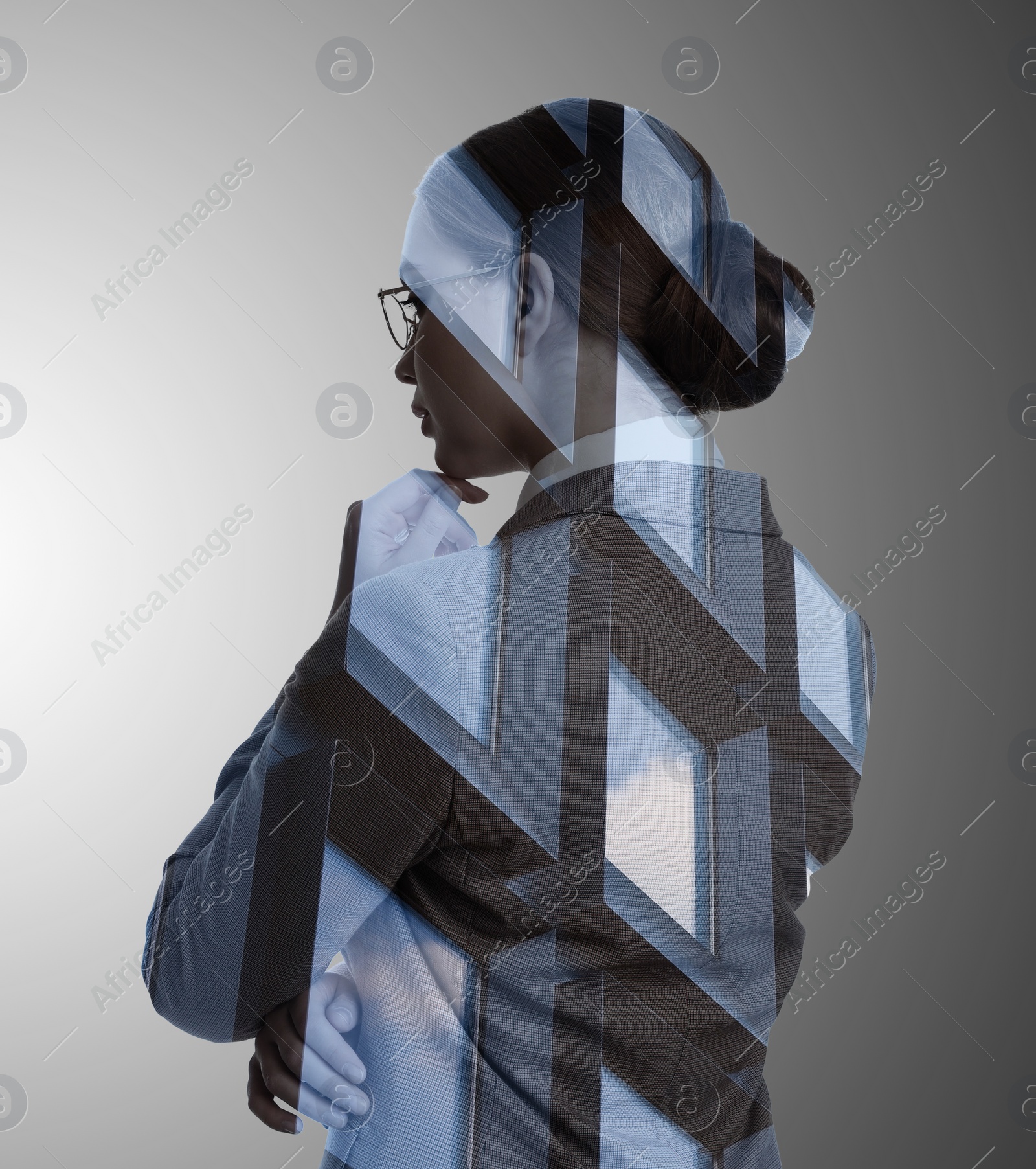 Image of Double exposure of businesswoman and office building