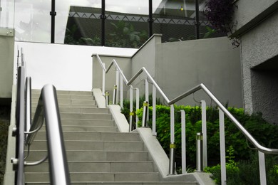 Photo of Outdoor staircase with metal handrails on city street