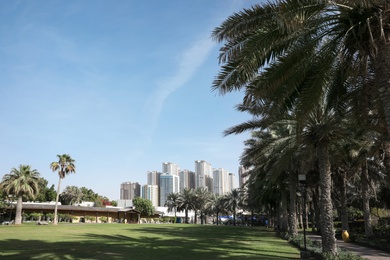 Photo of SHARJAH, UNITED ARAB EMIRATES - NOVEMBER 04, 2018: Beautiful landscape with tropical resort on sunny day