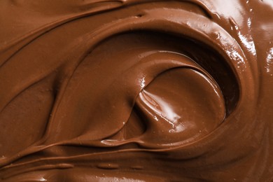 Tasty chocolate paste as background, closeup view