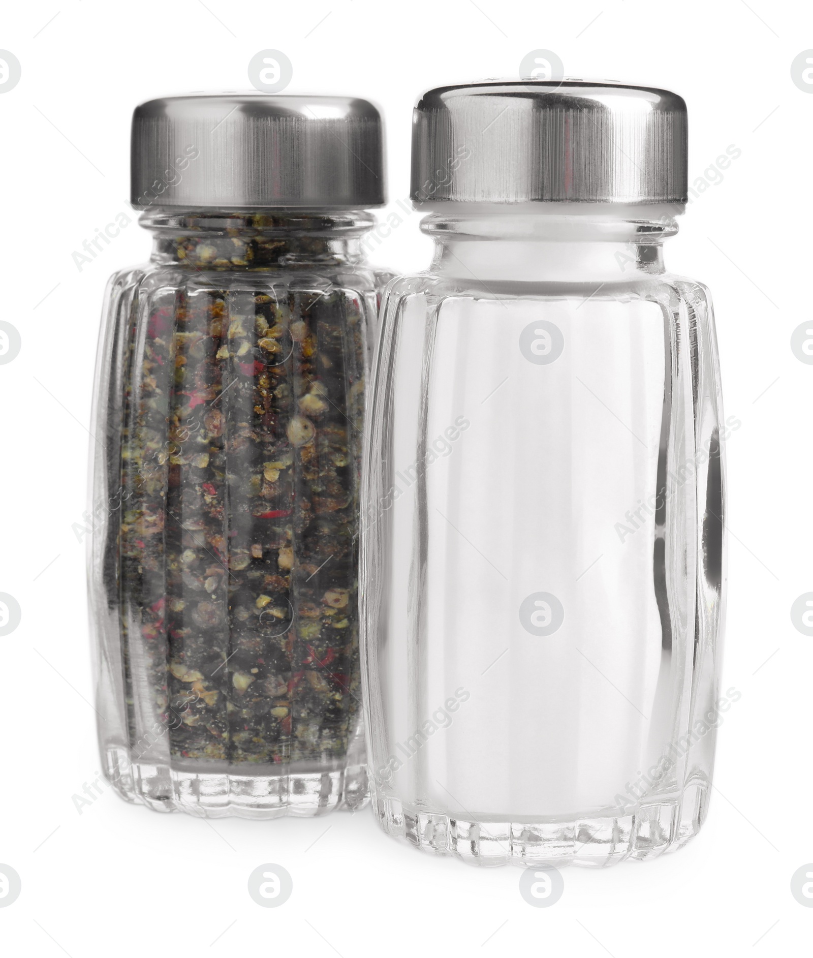 Photo of Salt and pepper shakers isolated on white