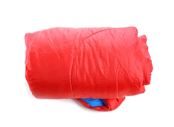 Photo of Rolled sleeping bag on white background. Camping equipment