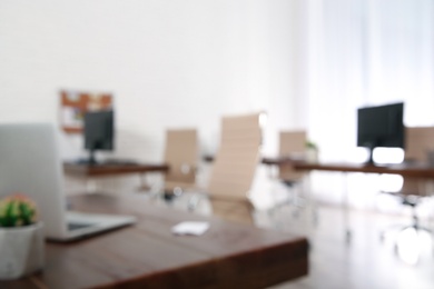 Photo of Modern brightly lit office with bokeh effect