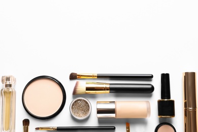 Photo of Different luxury makeup products on white background, top view