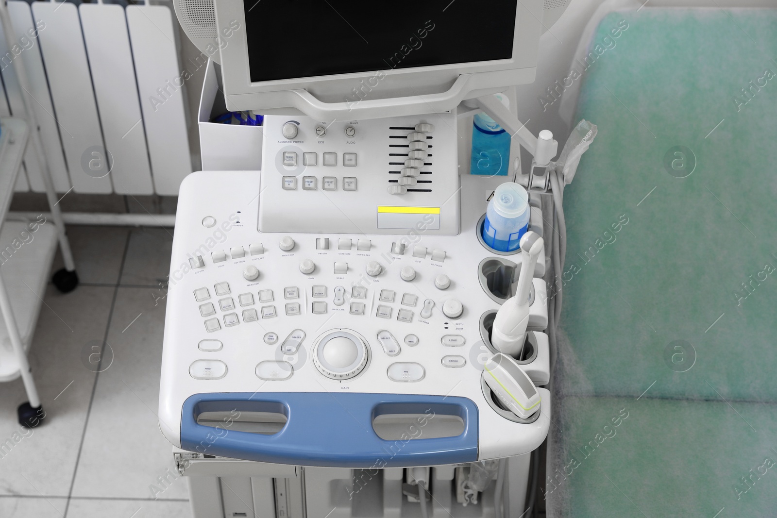 Photo of Ultrasound machine and examination table in hospital, above view