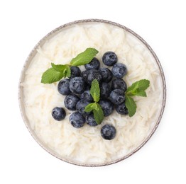 Photo of Delicious rice porridge with blueberries and mint isolated on white, top view