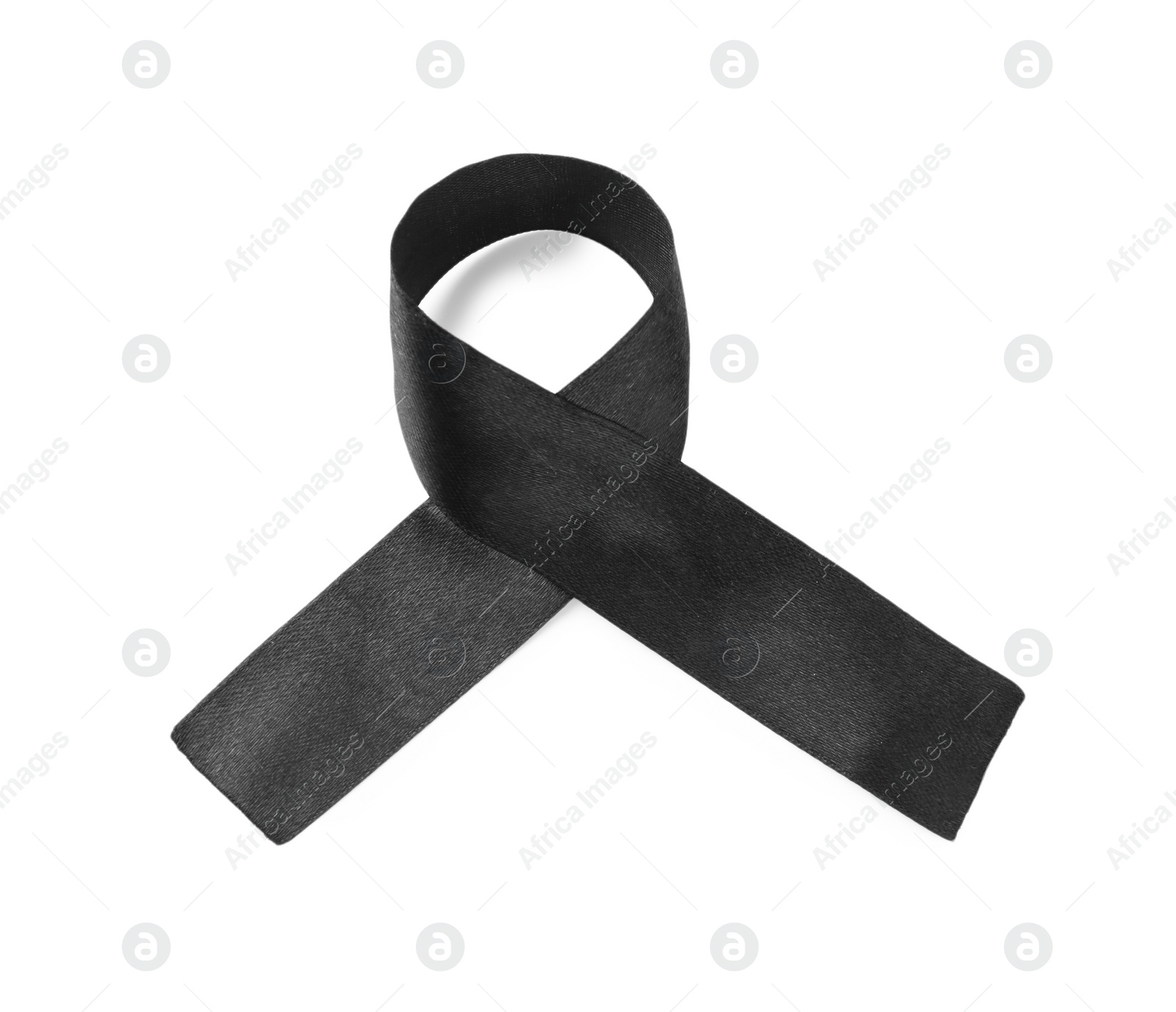 Photo of Black awareness ribbon isolated on white, top view