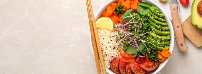 Image of Delicious vegan bowl with avocado, carrot and tomato on marble table, flat lay. Banner design with and space for text