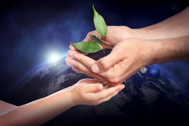 Make Earth green. Man passing soil with seedling to his child, closeup. Globe in space on background