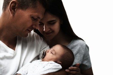 Image of Happy family with their cute baby on white background