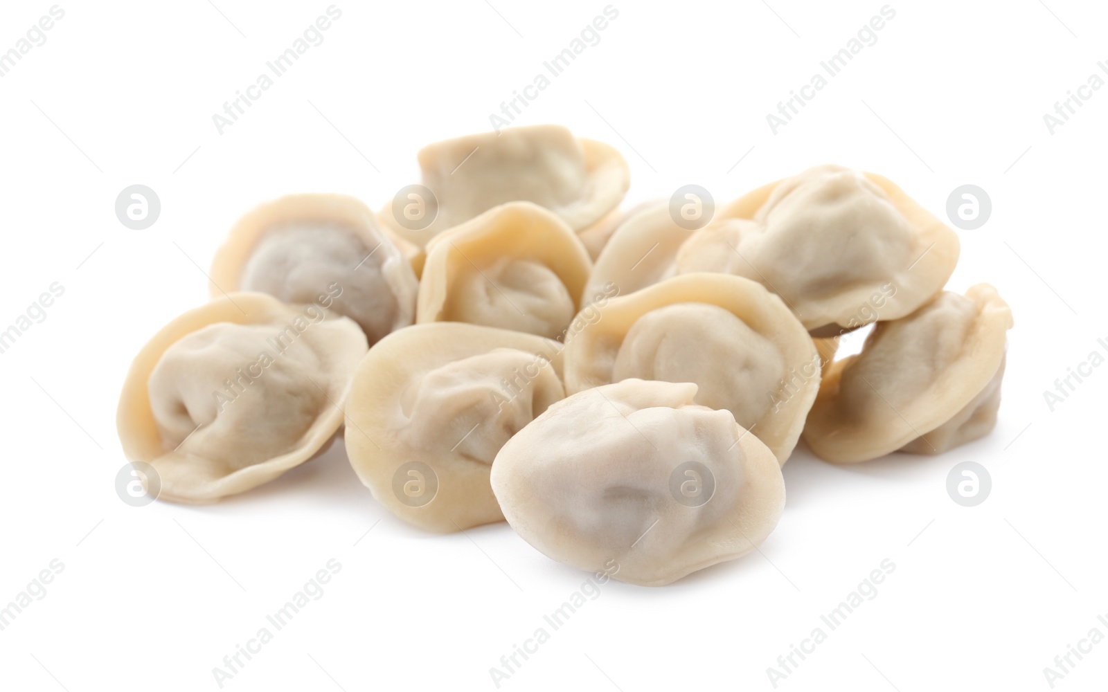 Photo of Pile of boiled dumplings on white background