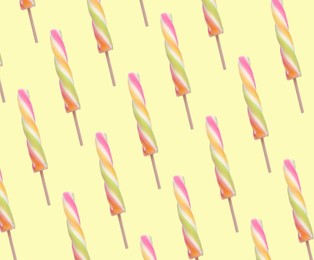 Image of Pattern with ice cream on pastel yellow background