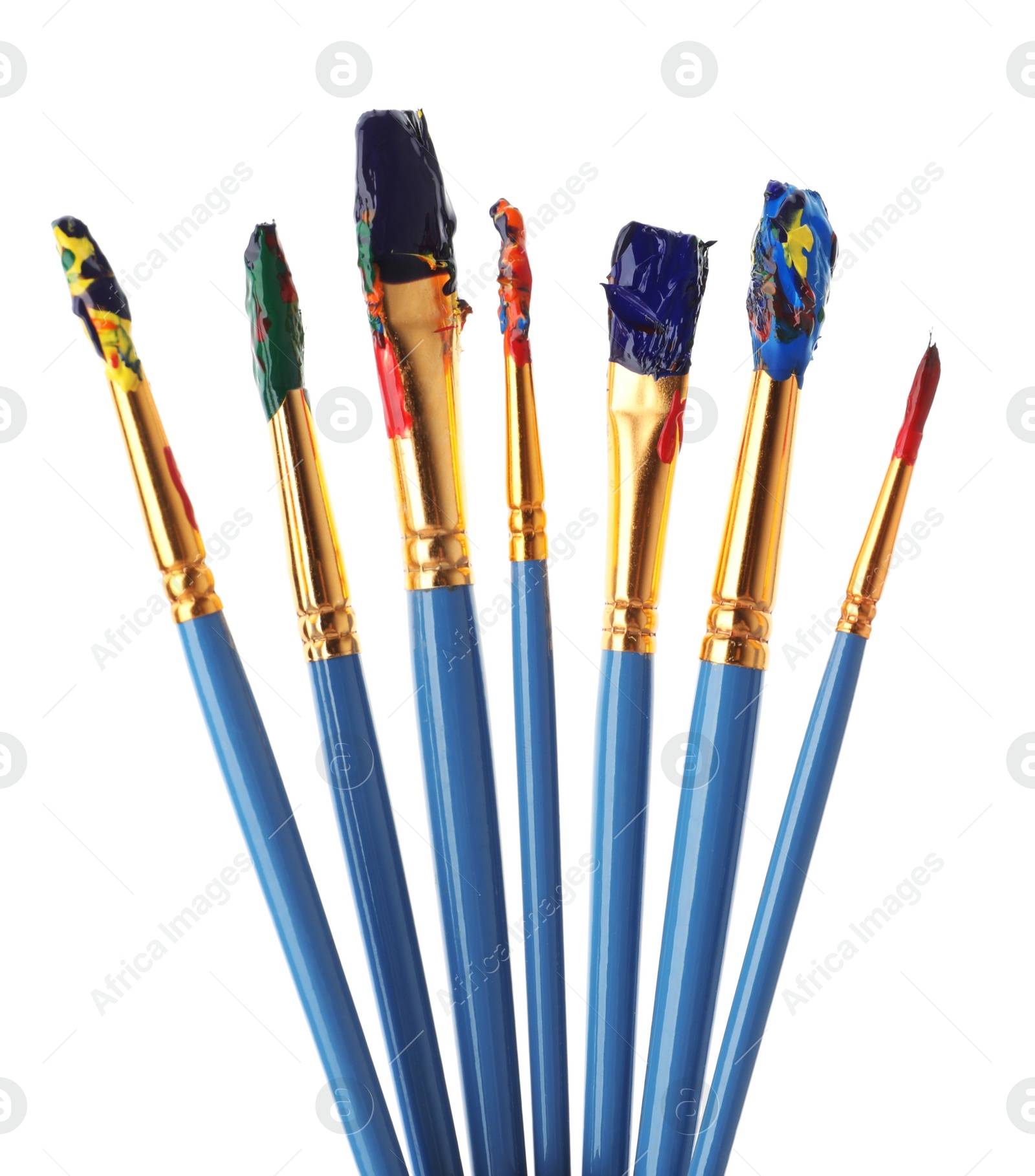 Photo of Different brushes with paints on white background