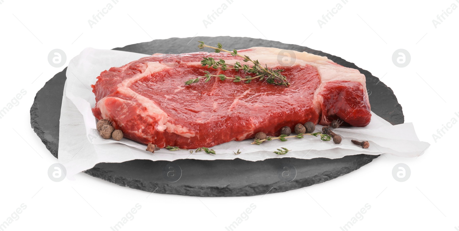 Photo of Piece of fresh beef meat, thyme and spices on white background