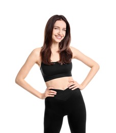 Happy young woman with slim body posing on white background