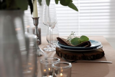 Festive table setting with beautiful tableware and decor indoors